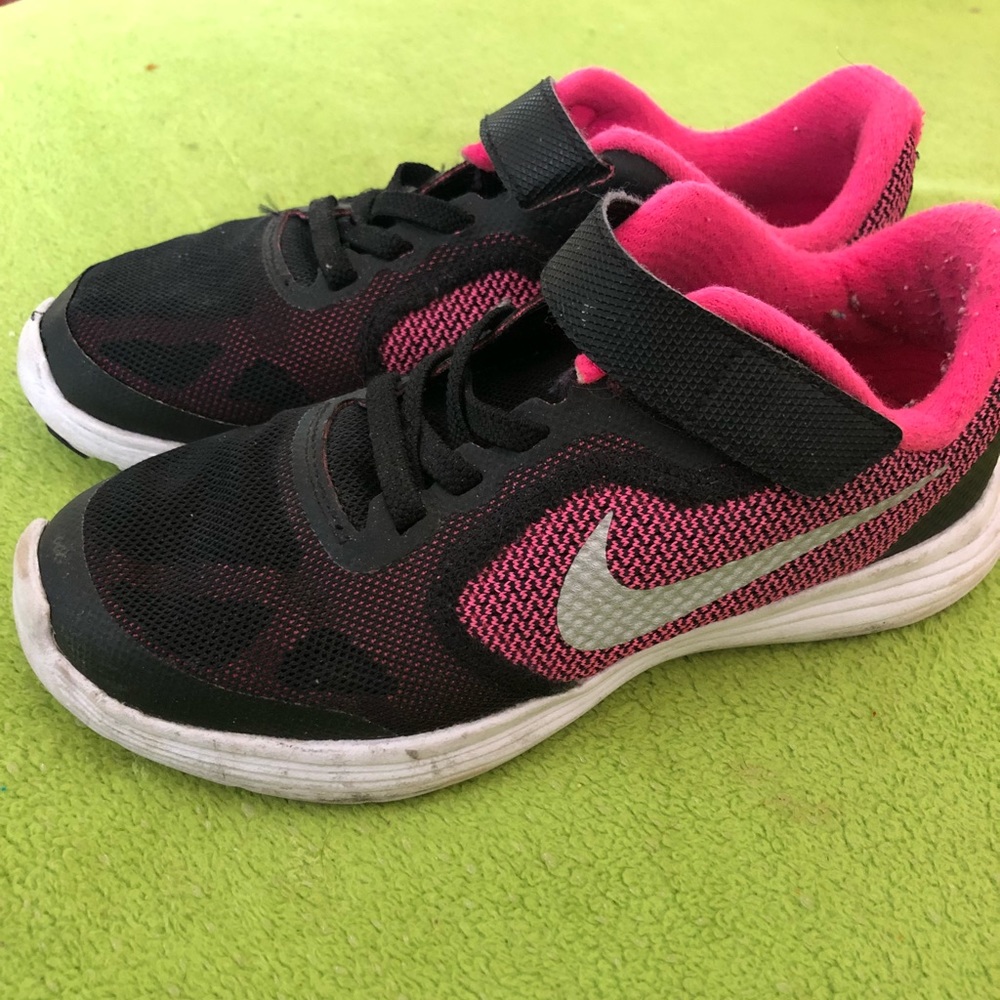 Black and pink Nikes